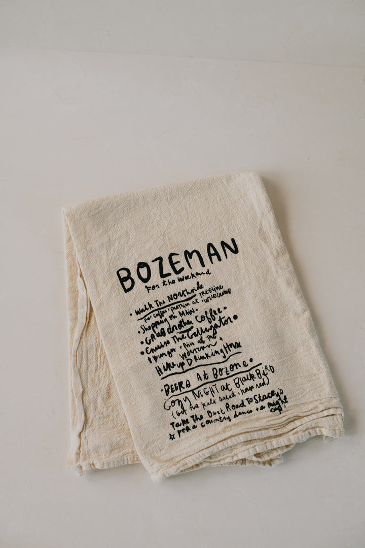 Intrigue Ink X Salchicha – Bozeman Day Dish Towel